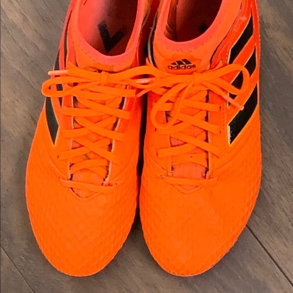 orange baseball cleats